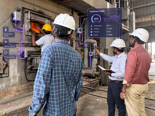 Engineers in hard hats at an industrial furnace, with IoT sensor readings and an equipment-health panel overlaid
